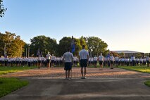 Airmen stand in formation prior to a wing run.