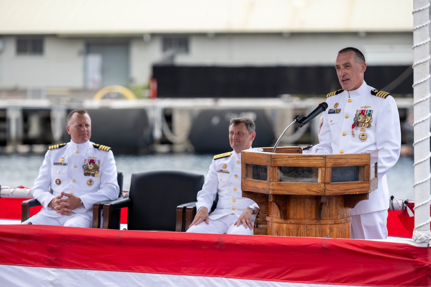 JOINT BASE PEARL HARBOR-HICKAM, Hawaii (July 25, 2025) - Capt. Corey Poorman, outgoing commander, Submarine Squadron (CSS) 7, delivers remarks during the CSS 7 change of command ceremony held aboard the Los Angeles-class fast-attack submarine USS Columbia (SSN 771), July 25, 2025. During the ceremony, Capt. Jeff Fassbender, from St. Marys, Kansas, relieved Poorman, from Severna Park, Maryland, as CSS 7 commodore. (U.S. Navy photo by Mass Communication Specialist 1st Class Scott Barnes)