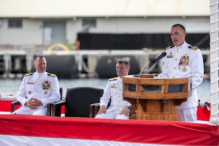 JOINT BASE PEARL HARBOR-HICKAM, Hawaii (July 25, 2025) - Capt. Corey Poorman, outgoing commander, Submarine Squadron (CSS) 7, delivers remarks during the CSS 7 change of command ceremony held aboard the Los Angeles-class fast-attack submarine USS Columbia (SSN 771), July 25, 2025. During the ceremony, Capt. Jeff Fassbender, from St. Marys, Kansas, relieved Poorman, from Severna Park, Maryland, as CSS 7 commodore. (U.S. Navy photo by Mass Communication Specialist 1st Class Scott Barnes)