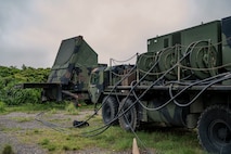 A U.S. Army AN/MPQ-65 radar assigned to the 1-1 Air Defense Artillery, right, receives fuel from an M1097A2 electric power plant on Kadena Air Base, Japan, July 24, 2025.