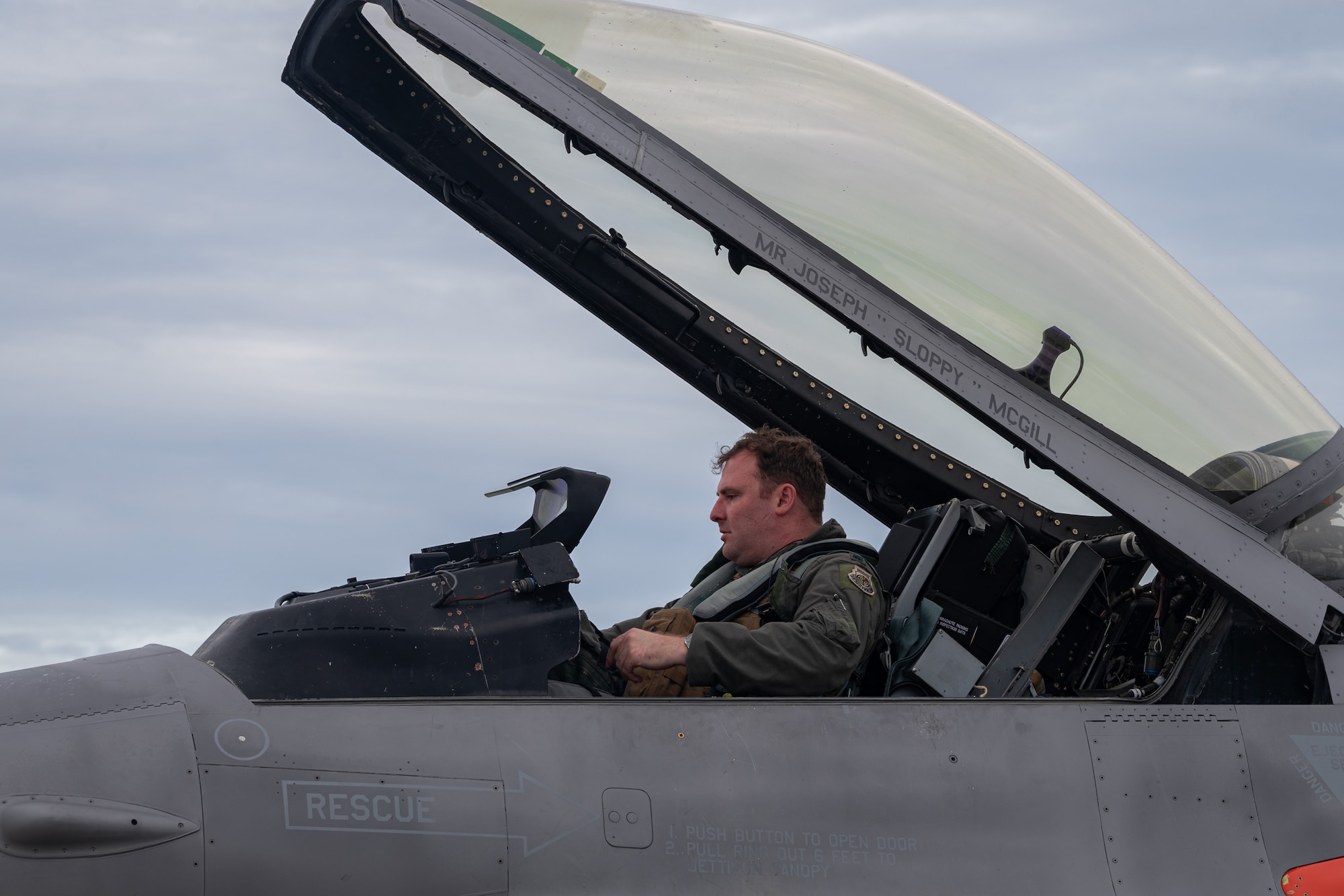 Photo of a commander preparing to conduct post-flight inspections