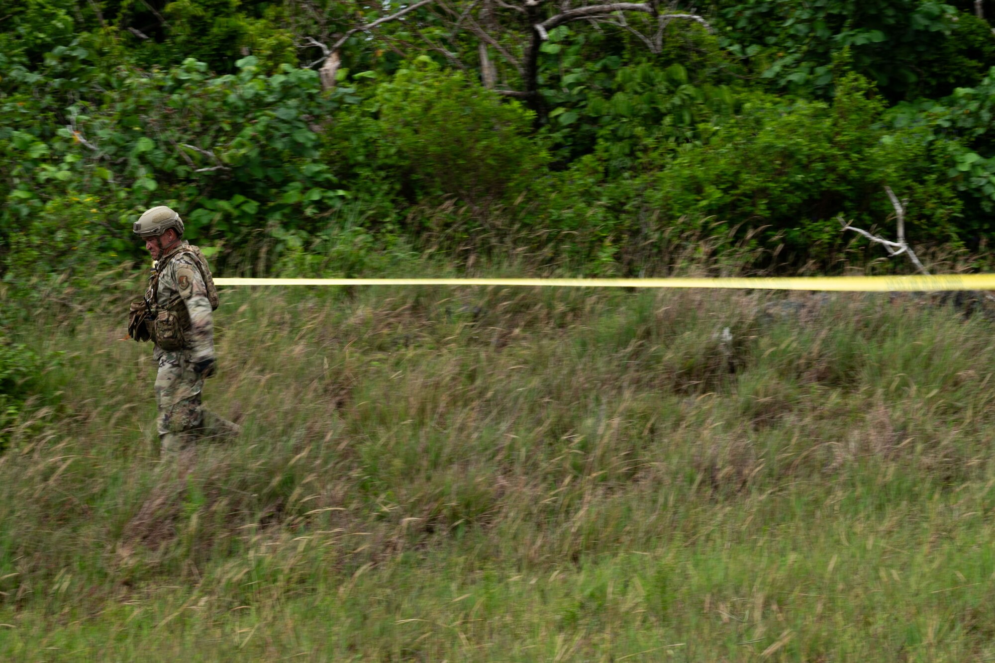 Photo of a squad leader cordoning a simulated affected area