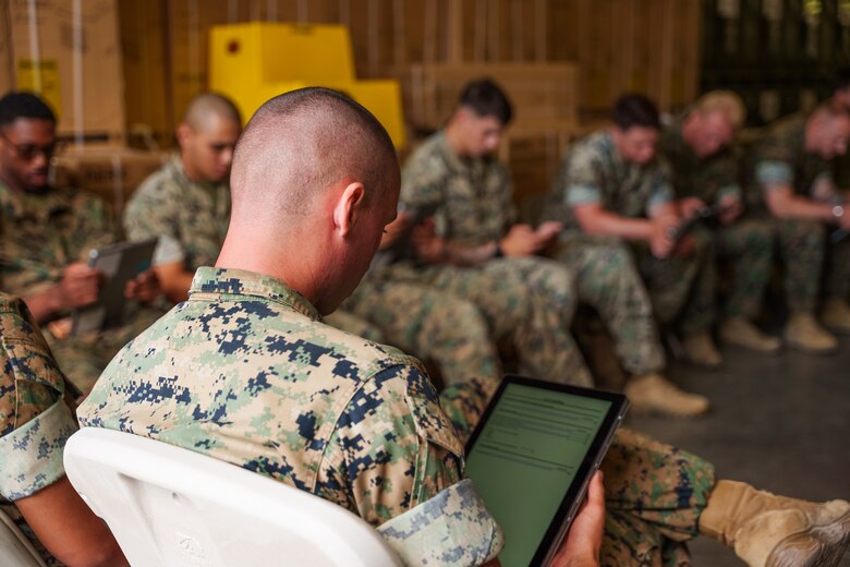 U.S. Marines with 1st Battalion, 5th Marine Regiment, complete electronic surveys during a limited user evaluation of main pack frame systems at Marine Corps Base Camp Pendleton, Calif.
