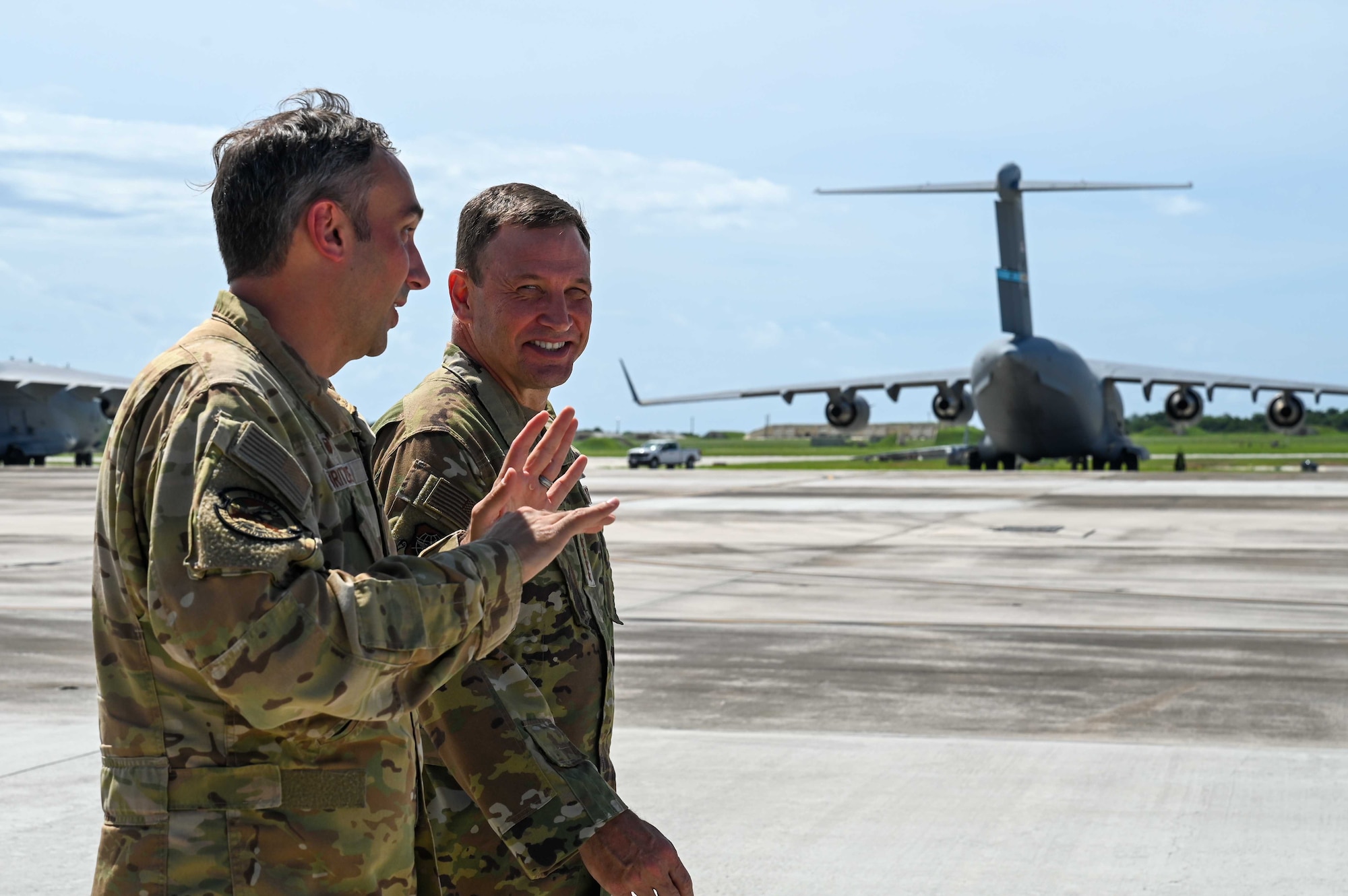 Photo of two commanders discussing Department-Level Exercise series support