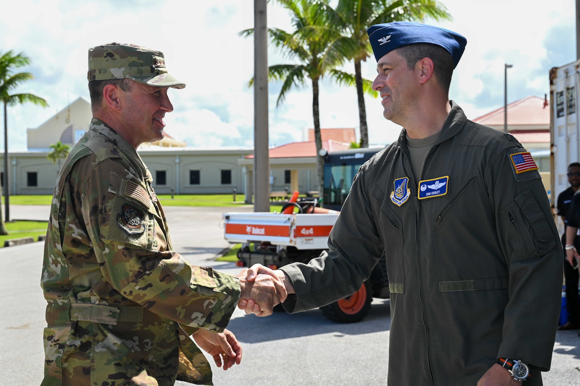 Photo of the Air Mobility Command commander greeting the 36th Wing commander