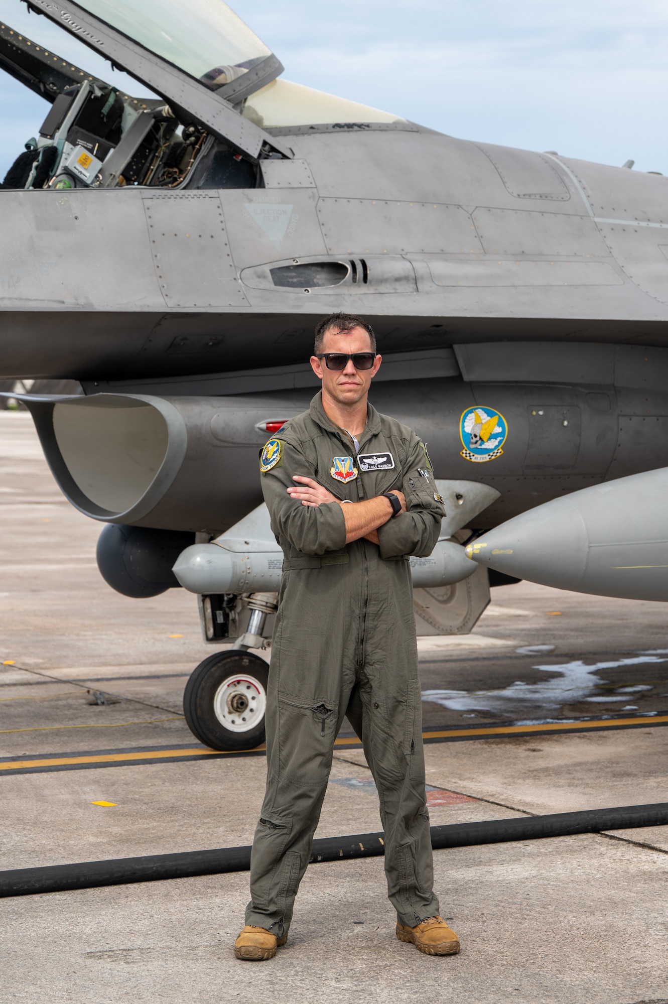 U.S. Air Force Lt. Col. Joe Gagnon poses in front of an F-16C Fighting Falcon.
