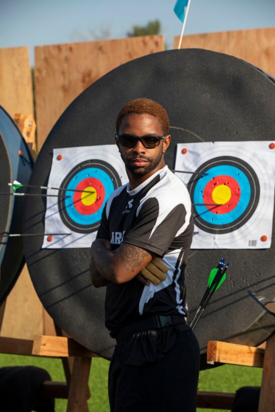 U.S. Army Staff Sgt. Allaijah Churchwell waits to return to the firing line after marking his score at the archery event during the 2025 Department of Defense Warrior Games in Colorado Springs, Colorado, July 25, 2025.