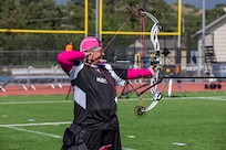 U.S. Army Master Sgt. Jodi Pyle-Vandersys aims her arrow at a target during the archery event at the 2025 Department of Defense Warrior Games in Colorado Springs, Colorado, July 25, 2025.