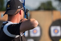 U.S. Army Staff Sgt. Coty Tuck competes in the archery event with a recurve bow during the 2025 Department of Defense Warrior Games at Washburn Field in Colorado Springs, Colorado, July 25, 2025.