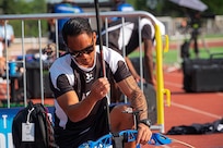 U.S. Army Staff Sgt. Nathaniel Mateo disassembles his recurve bow at the archery event during the 2025 Department of Defense Warrior Games at Washburn Field in Colorado Springs, Colorado, July 25, 2025
