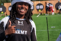 U.S. Army 1st Lt. Jani Merritt gives a thumbs up in celebration after winning her match at the archery event during the 2025 Department of Defense Warrior Games at Washburn Field in Colorado Springs, Colorado, July 25, 2025.
