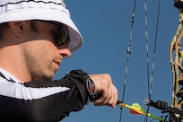 U.S. Army Retired  Spc. JP Lane nocks an arrow during the archery event at the 2025 Department of Defense Warrior Games at Washburn Field in Colorado Springs, Colorado, July 25, 2025.