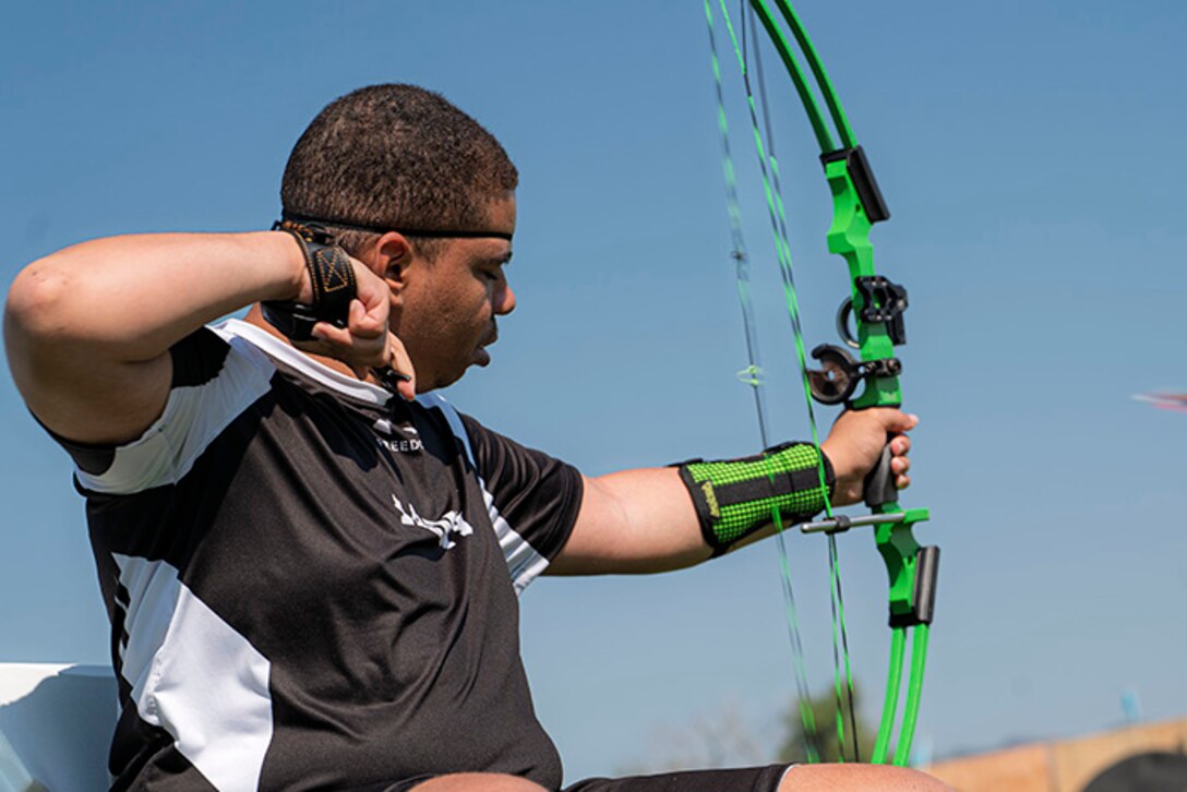 U.S. Army Retired Spc. Colby Maury-Rice releases an arrow from his compound bow while competing in the archery event at the 2025 Department of Defense Warrior Games at Washburn Field in Colorado Springs, Colorado, July 25, 2025