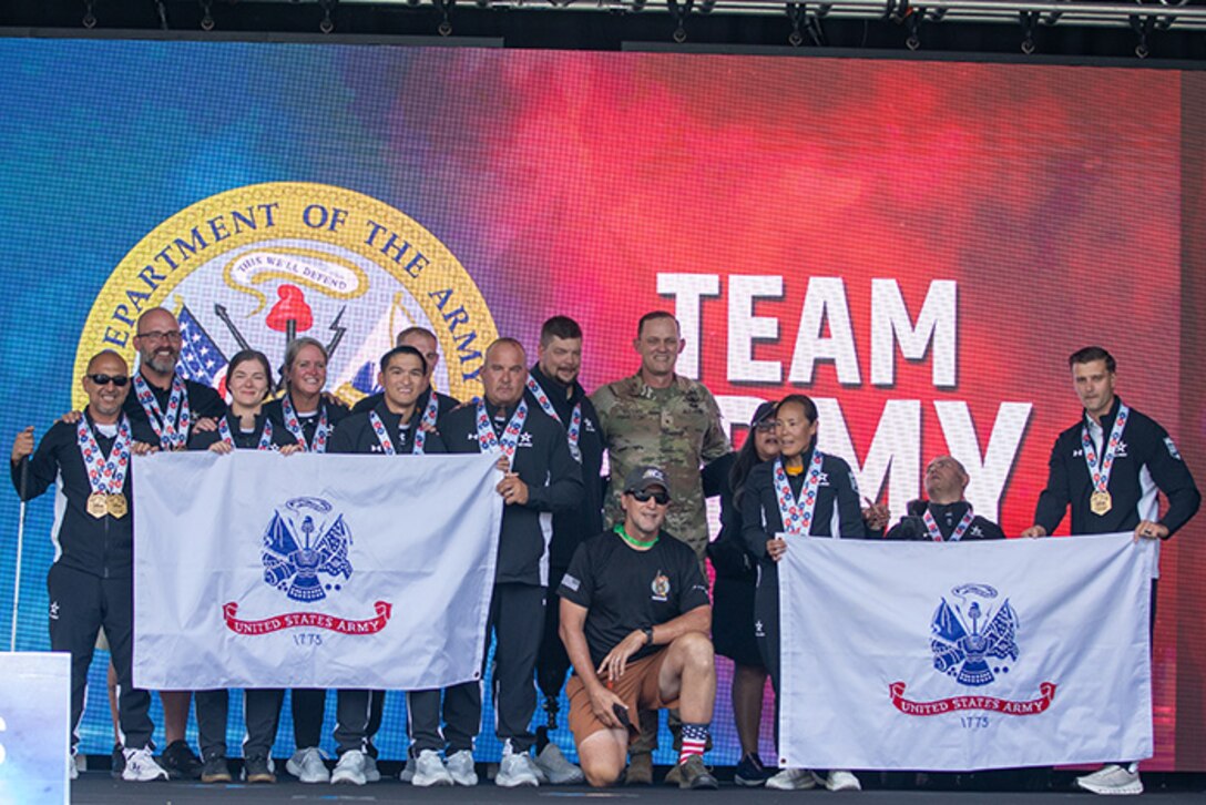 Team Army athletes receive 15 medals for the cycling event during the 2025 Department of Defense Warrior Games at Warrior Games Plaza, Colorado Springs, Colorado, July 20, 2025.