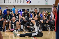 U.S. Army Sgt. Bianca Hayden, Team Army, serves the ball to Team Navy during a sitting volleyball match at the 2025 Department of Defense Warrior Games, Colorado Springs, Colorado, July 25, 2025.