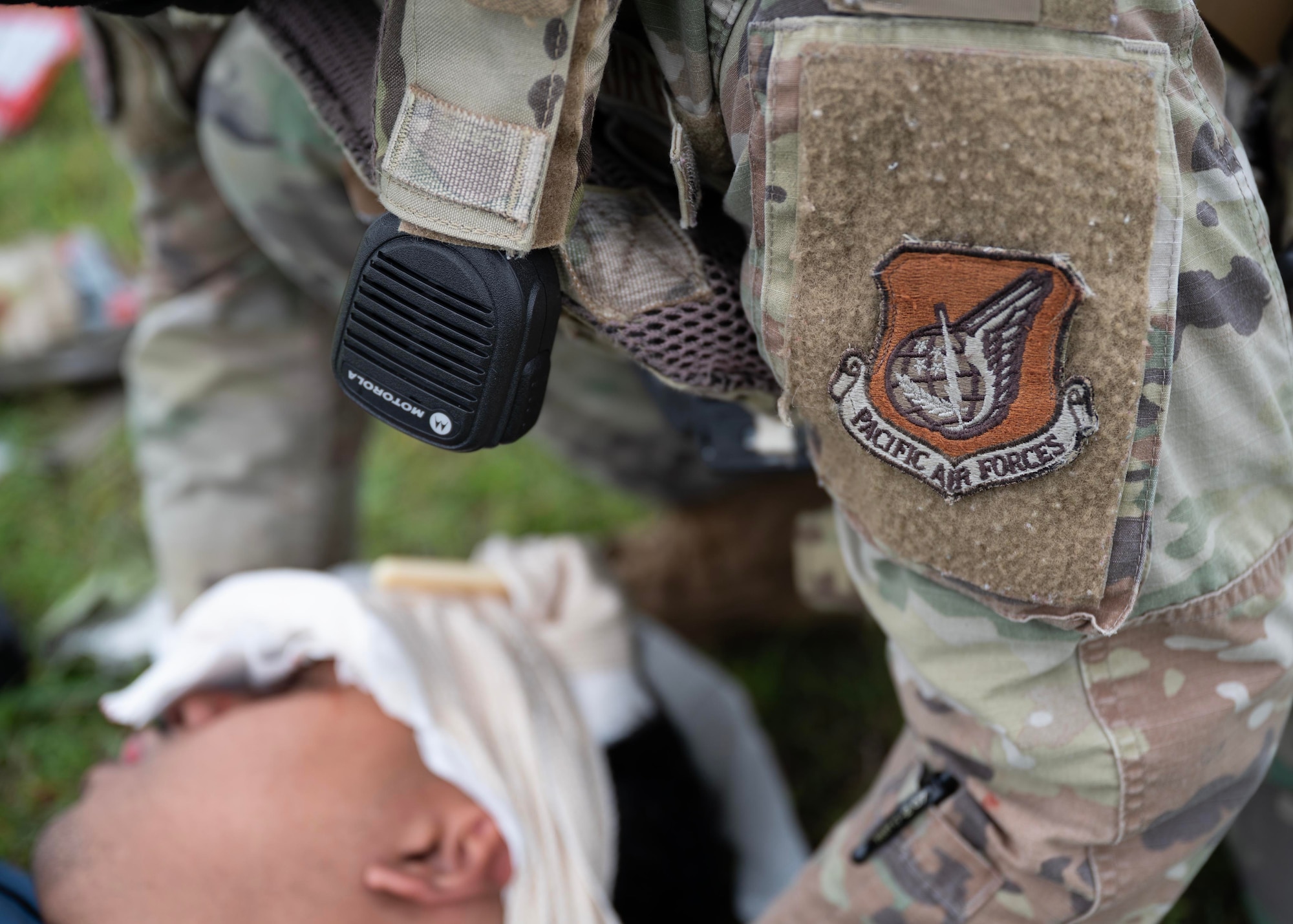 U.S. Air Force Airmen assigned to the 36th Security Forces Squadron perform tactical combat casualty care on a simulated mass casualty victim during exercise Resolute Force Pacific 2025 at Andersen Air Force Base, Guam, July 18, 2025.