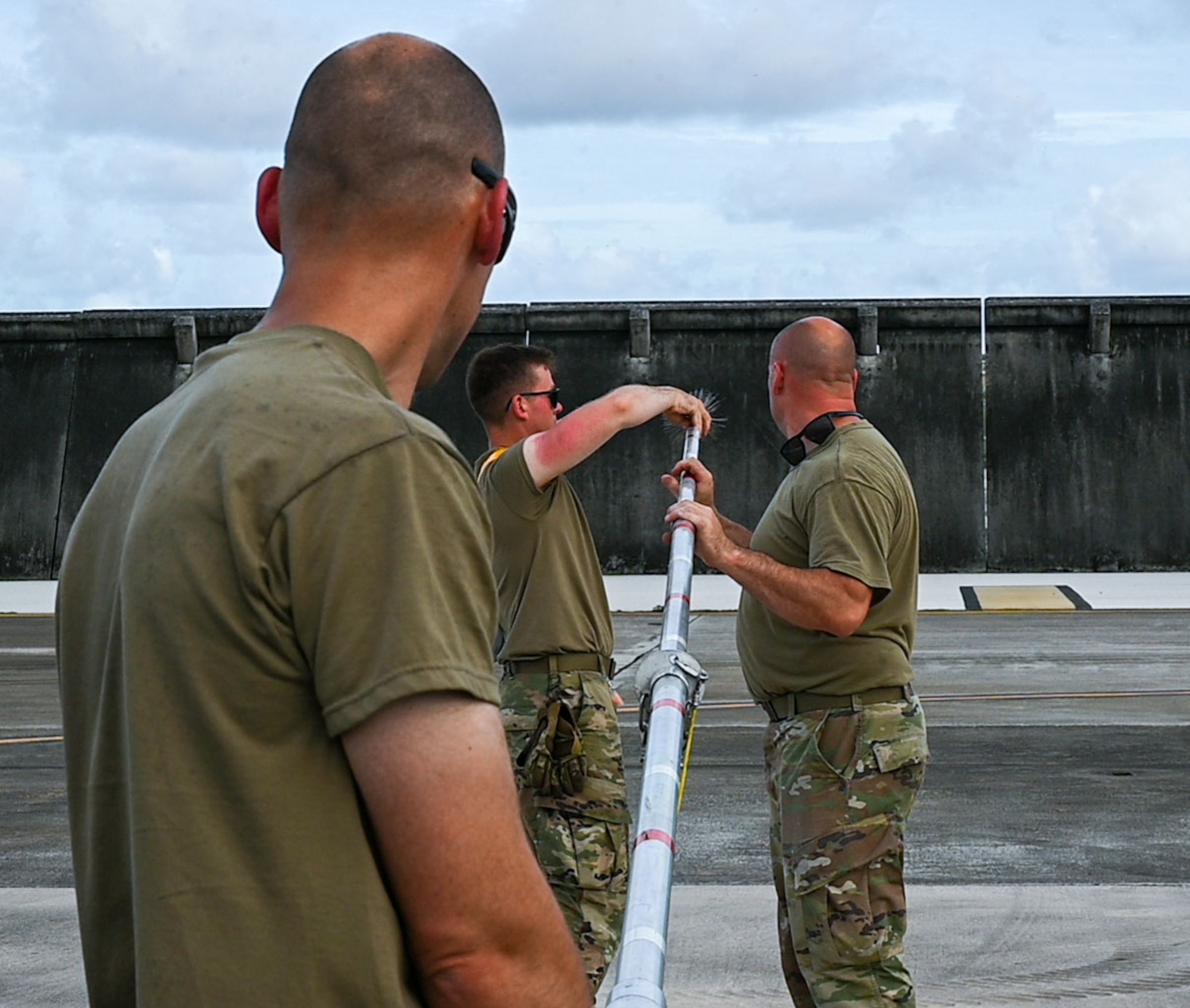 U.S. Air National Guardsmen set up lightning protection systems at Andersen Air Force Base, Guam.