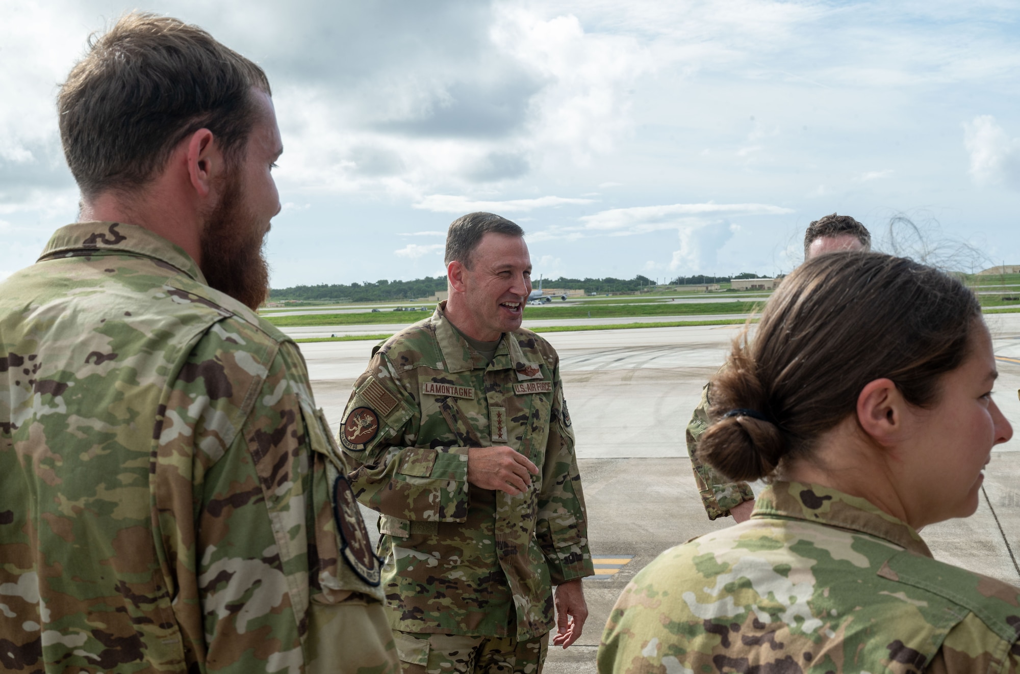 U.S. Air Force Gen. Johnny Lamontagne, commander of Air Mobility Command, says farewell to C-17 crew members after arriving at Andersen Air Force Base, Guam.