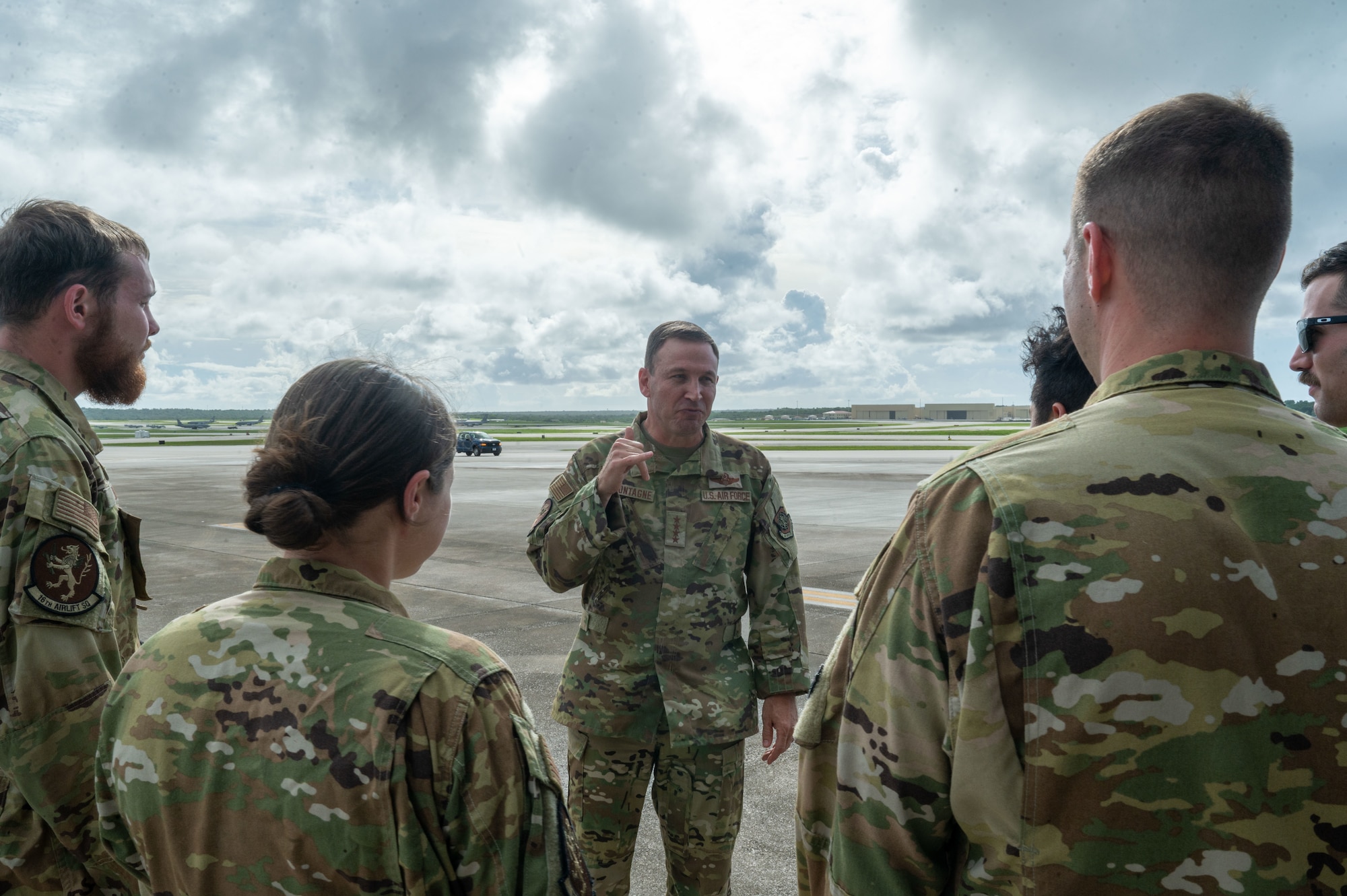 U.S. Air Force Gen. Johnny Lamontagne, commander of Air Mobility Command,  says farewell to a C-17 crew members after arriving at Andersen Air Force Base, Guam.
