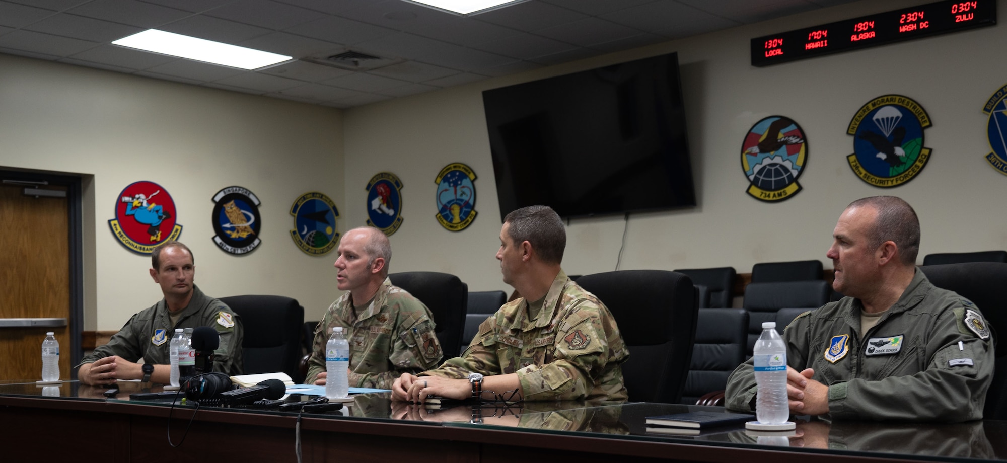 U.S. Air Force Col. Brandon Shroyer, 36th Air Expeditionary Wing commander, answers questions from local reporters about the Department-Level Exercise series during a roundtable talk at Andersen Air Force Base, Guam.