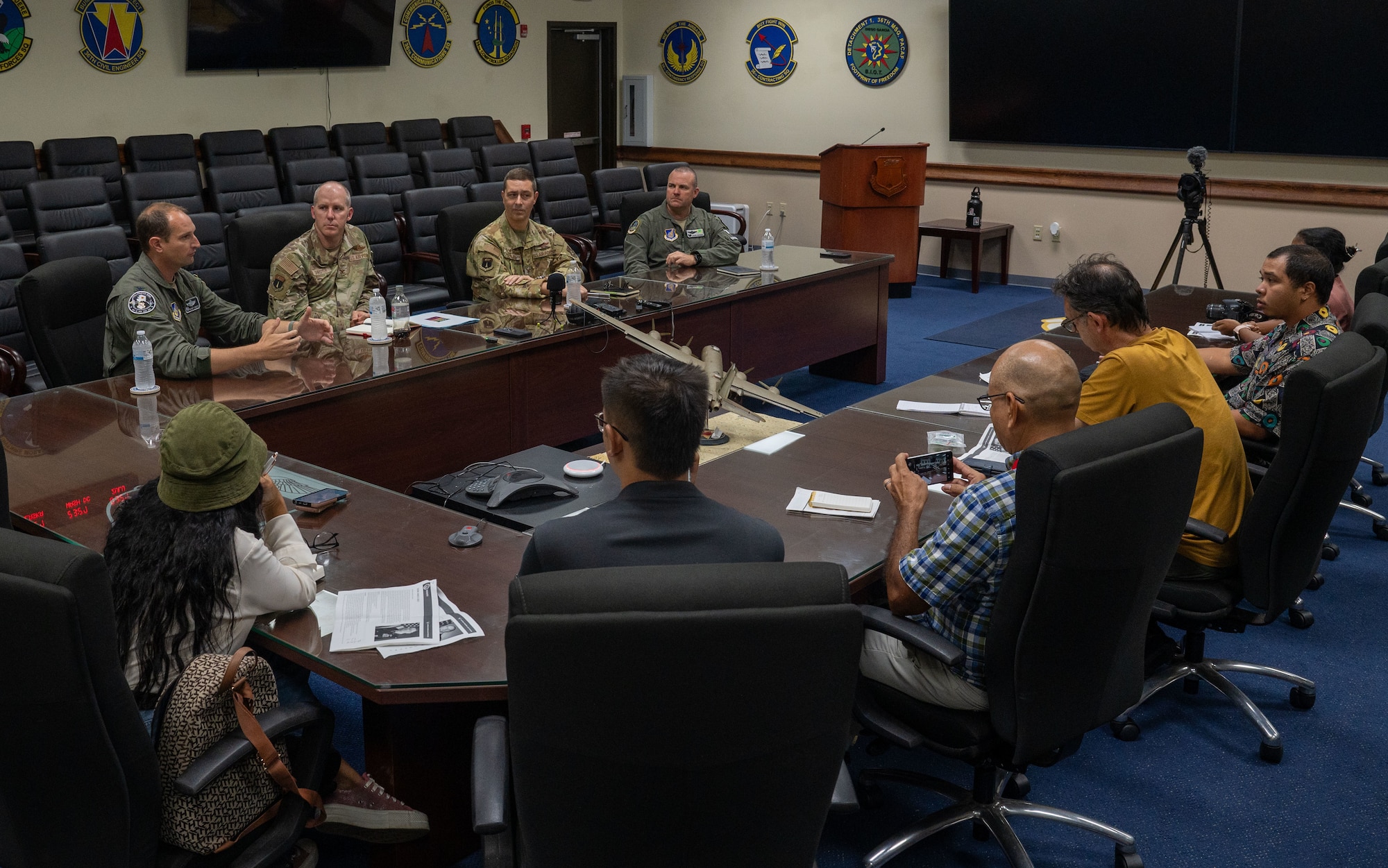 36th Wing base leadership answer questions from local Guam reporters about the Department-Level Exercise series at the 36th Wing headquarters conference room.