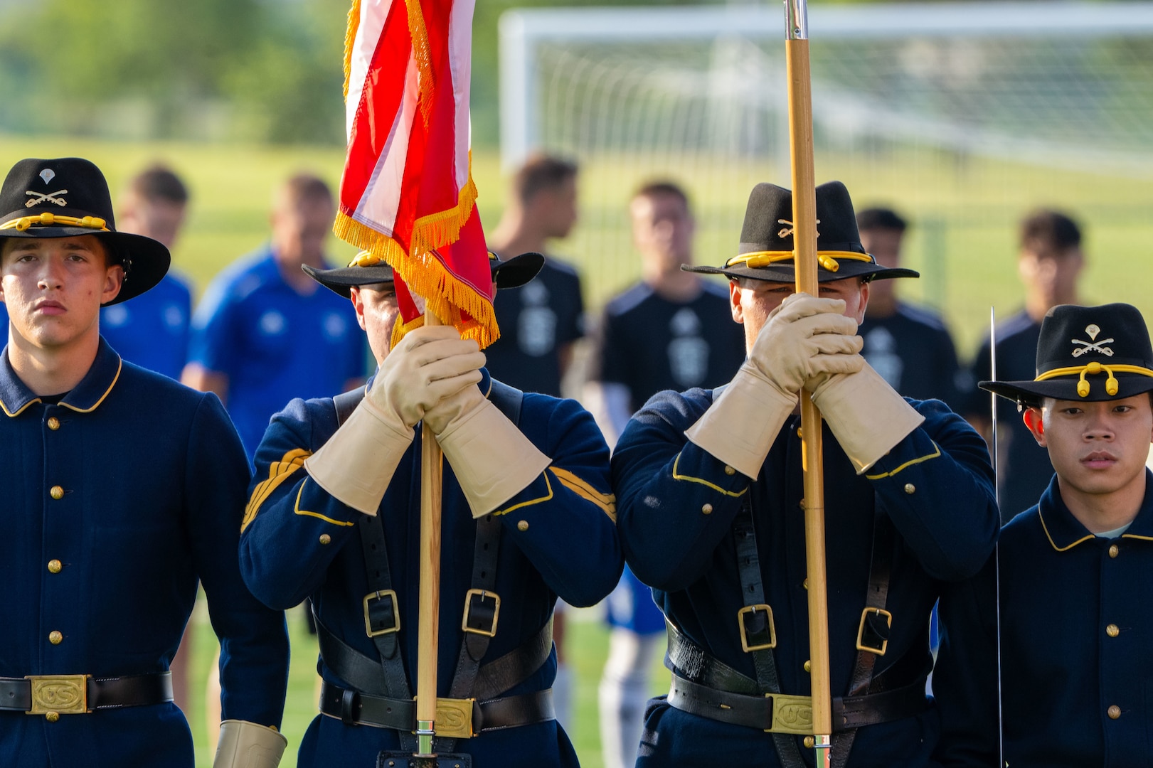 FORT HOOD, TEXAS (July 16, 2025) Members of the First Calvary Division Honor Guard present the national flag during the playing of the national anthem before the start of the Armed Forces Men’s Soccer Championship, July, 26, 2025 at Phantom Warrior Stadium, Fort Hood Texas. Military service teams, Army, Navy, and Air Force compete in a bracket tournament for the championship title. Armed Forces Sports fosters goodwill by promoting physical fitness, providing competitive opportunities for military athletes at national and international levels, enhancing recruitment and retention through sports diplomacy, and building strategic partnerships with allied nations. (U.S. Department of Defense photo by Mass Communication Specialist 2nd Class Theodore C. Lee)