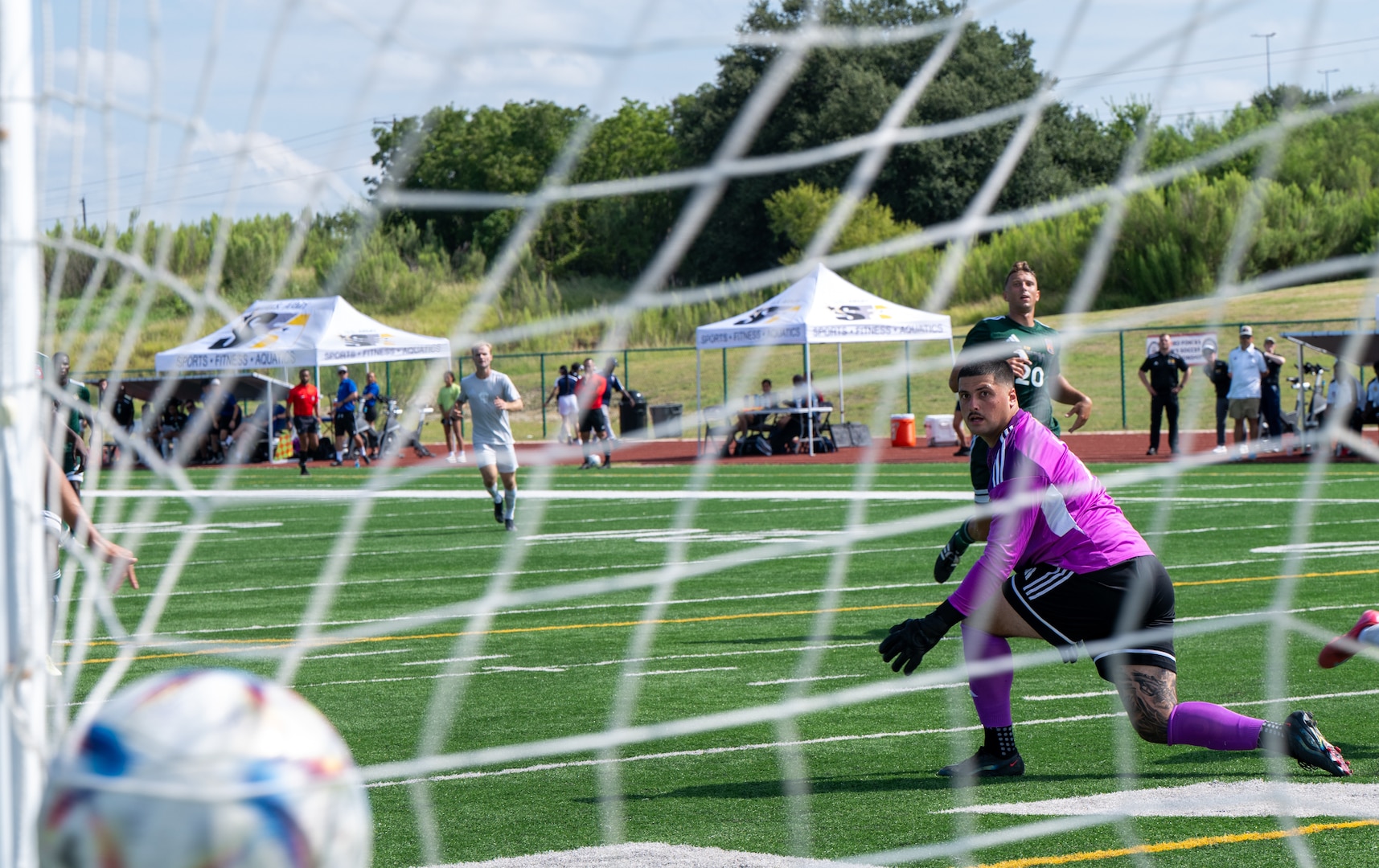 U.S. Air Force Airmen score another point against the Army team during the Armed Forces Men’s Soccer Championship in Phantom Warrior Stadium, Fort Hood, Texas, on July 26, 2025. Each team faces off in a bracket to determine which service will hold the championship title, featuring teams from the Army, Navy, and Air Force. (U.S. Army photo by Sgt. Tien Dat Ngo)