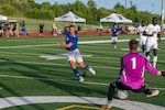 FORT HOOD, TEXAS (July 27, 2025) U.S. Air Force 2nd Lieutenant Thaddeus Dewing, forward for the U.S. Air Force Armed Forces Sports Men’s Soccer team, shoots a goal during the Armed Forces Men’s Soccer Championship, July, 27, 2025 at Phantom Warrior Stadium, Fort Hood Texas. Military service teams, Army, Navy, and Air Force compete in a bracket tournament for the championship title. Armed Forces Sports fosters goodwill by promoting physical fitness, providing competitive opportunities for military athletes at national and international levels, enhancing recruitment and retention through sports diplomacy, and building strategic partnerships with allied nations. (U.S. Department of Defense photo by Mass Communication Specialist 2nd Class Theodore C. Lee)