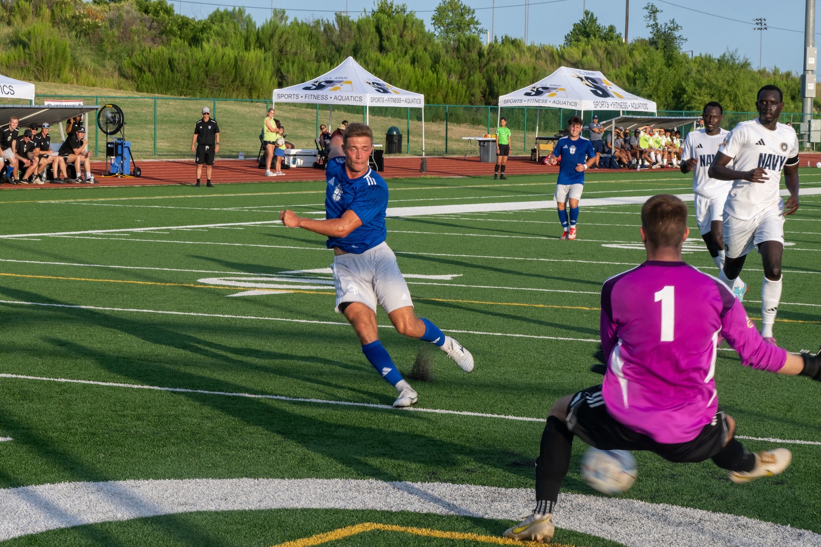 FORT HOOD, TEXAS (July 27, 2025) U.S. Air Force 2nd Lieutenant Thaddeus Dewing, forward for the U.S. Air Force Armed Forces Sports Men’s Soccer team, shoots a goal during the Armed Forces Men’s Soccer Championship, July, 27, 2025 at Phantom Warrior Stadium, Fort Hood Texas. Military service teams, Army, Navy, and Air Force compete in a bracket tournament for the championship title. Armed Forces Sports fosters goodwill by promoting physical fitness, providing competitive opportunities for military athletes at national and international levels, enhancing recruitment and retention through sports diplomacy, and building strategic partnerships with allied nations. (U.S. Department of Defense photo by Mass Communication Specialist 2nd Class Theodore C. Lee)