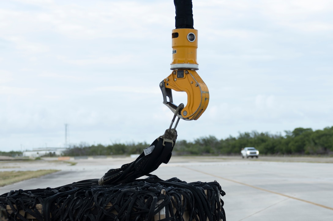U.S. Marines with 2nd Marine Aircraft Wing (MAW) and 2nd Distribution Support Battalion (DSB) perform external lifts at Naval Air Station Key West, Florida, July 23, 2025. Marines with 2nd MAW and 2nd DSB are training alongside elements of the U.S. Army, U.S. Navy, and U.S. Customs and Border Protection to refine humanitarian assistance and disaster relief capabilities while also refining the CH-53K King Stallion's ability to support distributed aviation operations in a joint environment. (U.S. Marine Corps photo by Cpl. Mya Seymour)