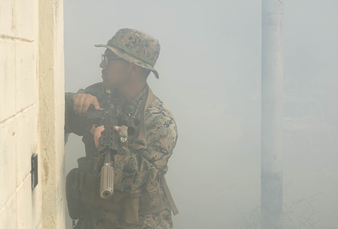 A U.S. Marine with Golf Company, 2nd Battalion, 23rd Marines, forward deployed with 4th Marine Regiment, 3rd Marine Division as part of the Unit Deployment Program, conduct room clearing during the Korean Marine Exercise Program in Pohang, South Korea, July 22, 2025. KMEP is conducted regularly between the ROK and U.S. Marine Corps to increase their combined capabilities through realistic training geared towards deterring threats and maintaining peace in the Indo-Pacific. Hull is a native of California. (U.S. Marine Corps photo by Cpl. Kanoa Thomas)