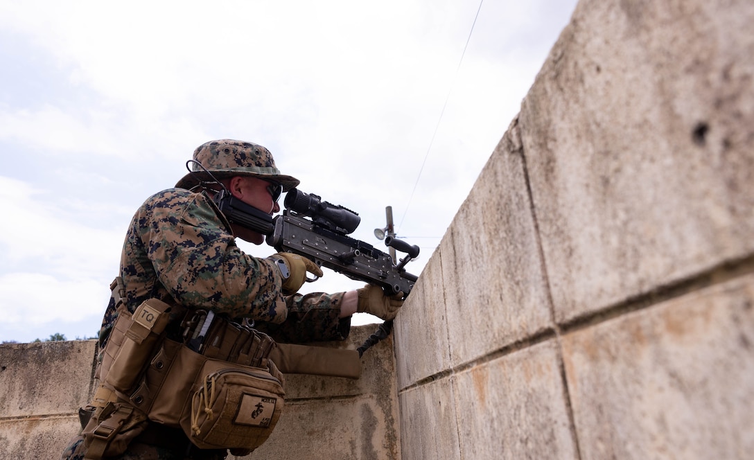 U.S. Marine Corps Lance Cpl. Nolan Mckee, a machine gunner with Golf Company, 2nd Battalion, 23rd Marines, forward deployed with 4th Marine Regiment, 3rd Marine Division as part of the Unit Deployment Program, provides security during the Korean Marine Exercise Program, July 21, 2025. KMEP is conducted regularly between the ROK and U.S. Marine Corps to increase their combined capabilities through realistic training geared towards deterring threats and maintaining peace in the Indo-Pacific. Mckee is a native of Arkansas.  (U.S. Marine Corps photo by Cpl. Kanoa Thomas)