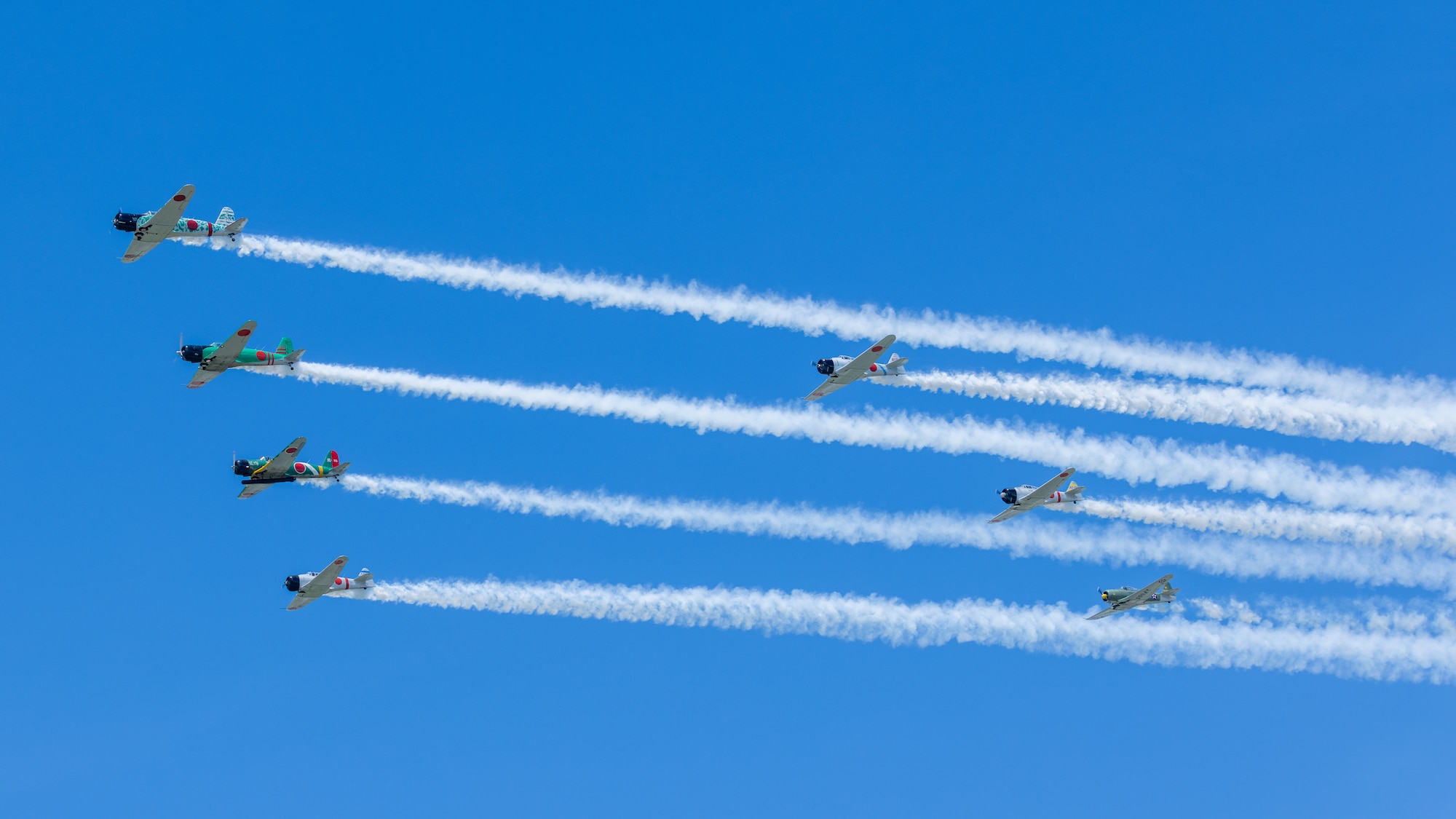 Seven aircraft in sky.