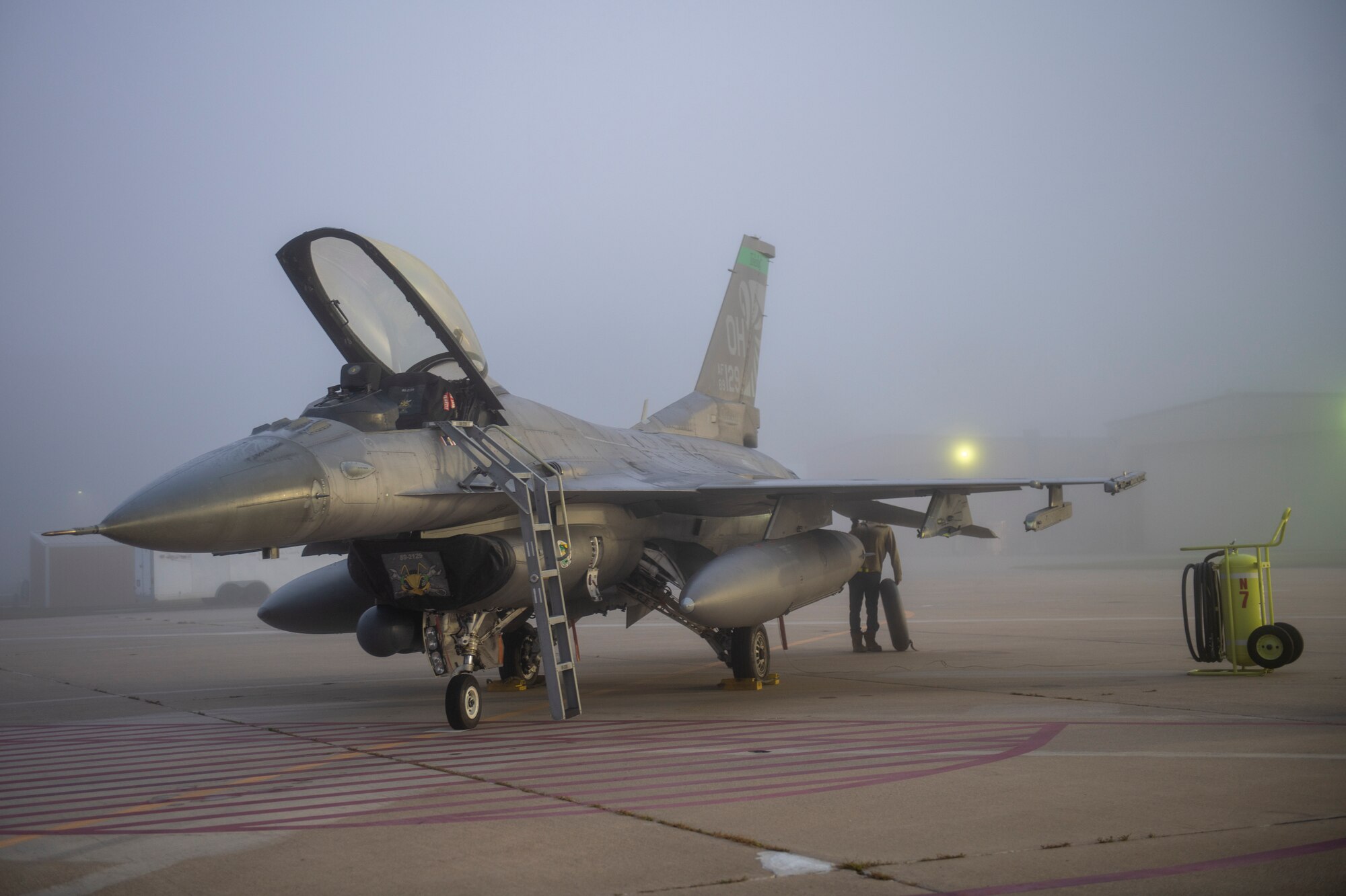 air plane sits on flight line