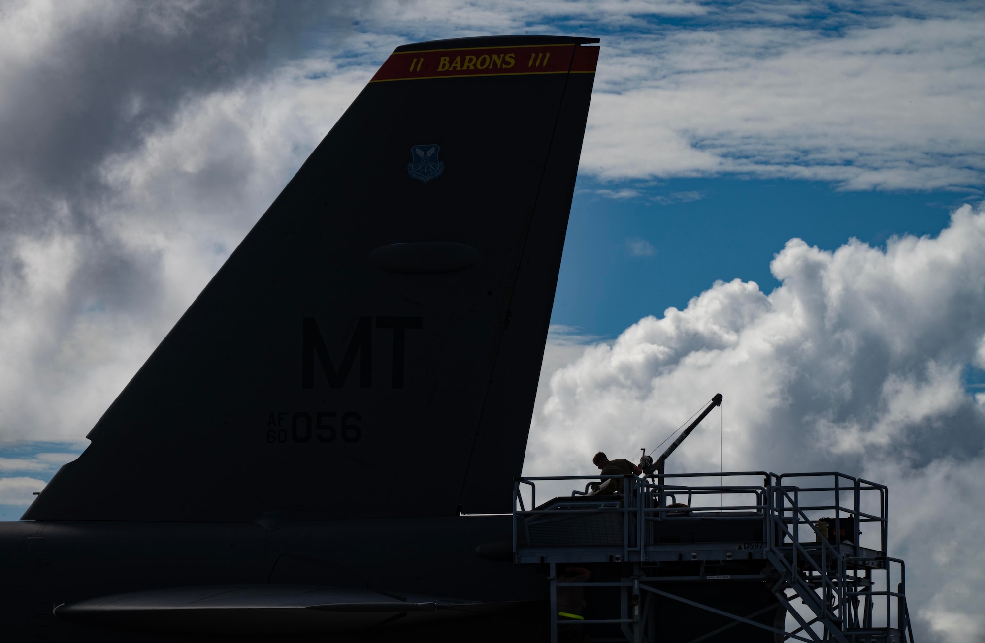 U.S. Air Force crew chiefs, assigned to the 23rd Expeditionary Bomb Squadron, perform post-flight maintenance on a USAF B-52H Stratofortress, assigned to the 23rd EBS, Minot Air Force Base, North Dakota, after a Bomber Task Force mission at Andersen Air Force Base, Guam, July 21, 2025. Regular bomber missions in the Indo-Pacific ensure our crews are highly trained, fully prepared, and capable of operating anytime, anywhere to defend U.S. interests and support our allies. (U.S. Air Force photo by Senior Airman Alyssa Bankston)