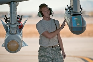 Staff Sgt. Jamie Case looks over a targeting pod attached to an A-10 Thunderbolt II during the Green Flag West 11-2 exercise Dec. 6, 2010, at Nellis Air Force Base, Nev. Sergeant Case is with the 23rd Aircraft Maintenance Squadron at Moody AFB, Ga.