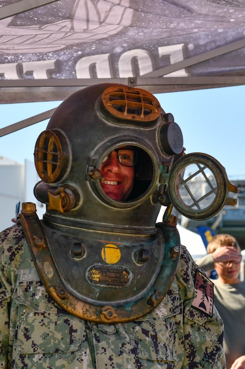 NORFOLK, VA (Oct. 19, 2024) - A Sailor wears diving equipment at a demonstration at Naval Station Norfolk's Fleet Fest 2024.