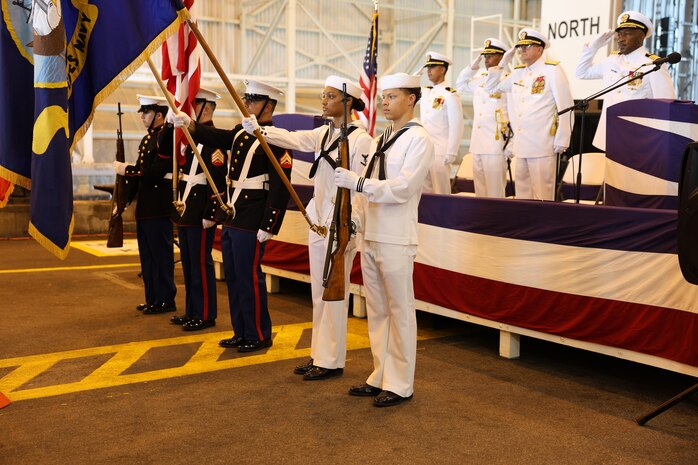 KINGS BAY, GA. (June 18, 2025) – The Marine Corps Security Force Battalion Kings Bay color guard presents the colors during a change of command ceremony held at the Explosives Handling Wharf onboard Naval Submarine Base Kings Bay, Ga., June 18, 2025. During the ceremony, Capt. Gregory Price relieved Capt. Juan Hines as commanding officer of Strategic Weapons Facility, Atlantic. SWFLANT’s mission is to deliver safe, secure and effective sea-based strategic deterrence capabilities to fleet ballistic missile submarines. (U.S. Navy photo by Ashley Berumen)