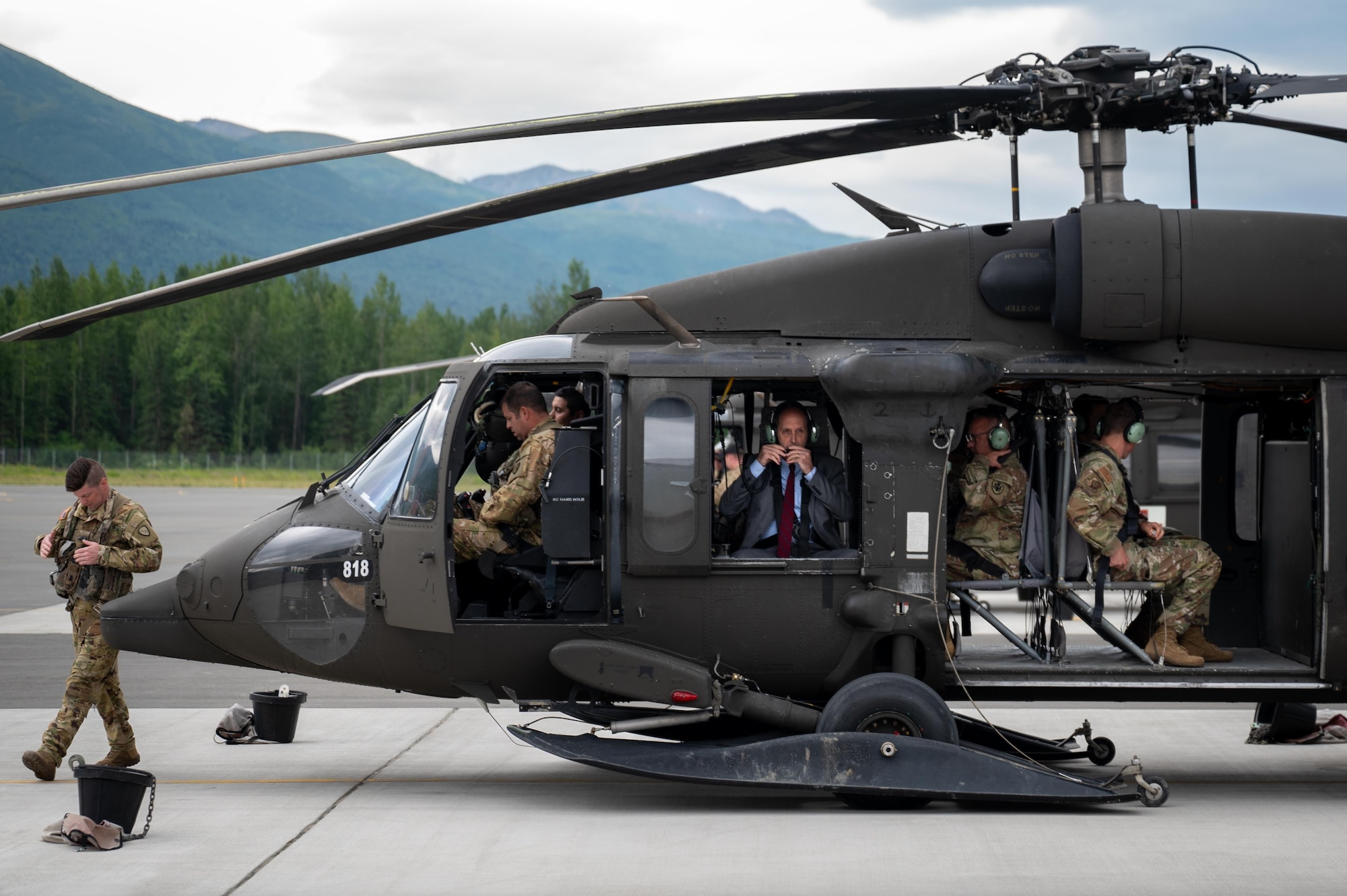 Dr. Stephen Ferrara, acting Assistant Secretary of Defense for Health Affairs, boards a UH-60 Black Hawk assigned to A Company, 1st Battalion, 168th General Support Aviation Brigade, Alaska Army National Guard, at Joint Base Elmendorf-Richardson, Alaska, July 16, 2025.