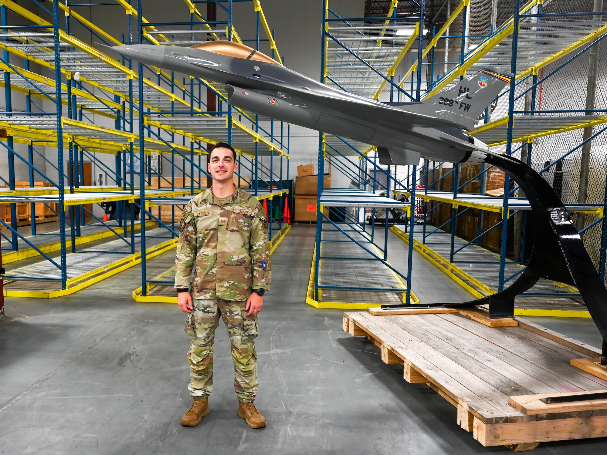 U.S. Air Force Staff Sgt. John Cardoza, 42d Logistics Readiness Squadron noncommissioned officer in charge of outbound cargo, poses for a photo in the logistics warehouse at Maxwell Air Force Base, Alabama, July 23, 2025. The team ensures all outbound shipments are correctly documented, packaged, and moved by ground, air or sea in accordance with Air Force and Department of Defense regulations. (U.S. Air Force photo by Senior Airman Tanner Doerr)