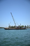 The barge from the vessel collision near Hibiscus Island, July 28, 2025. Coast Guard Sector Miami crews are investigating the potential causes of the collision. (U.S. Coast Guard photo by Petty Officer 3rd Class Jessica Walker)