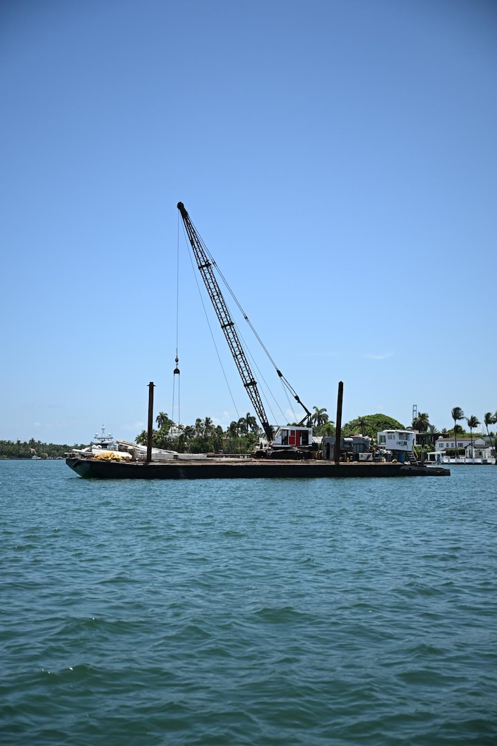 The barge from the vessel collision near Hibiscus Island, July 28, 2025. Coast Guard Sector Miami crews are investigating the potential causes of the collision. (U.S. Coast Guard photo by Petty Officer 3rd Class Jessica Walker)