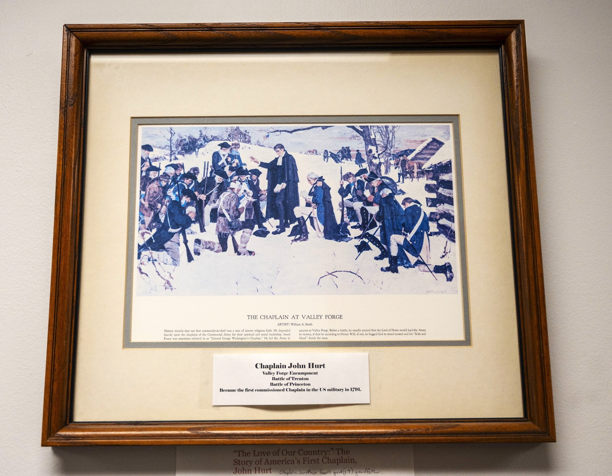 “The Chaplain at Valley Forge,” a painting depicting the first U.S. Army chaplain Rev. John Hurt during the Revolutionary War, hangs in the McGuire Chapel outside the office of U.S. Air Force Chaplain (Col.) Jonathan Hurt, Joint Base McGuire-Dix-Lakehurst senior chaplain, at JB MDL, N.J., June 5, 2025. Hurt discovered the painting when he arrived at JB MDL shortly after learning that Rev. John Hurt is his seventh great grandfather. (U.S. Air Force photo by Susan Moriarty)