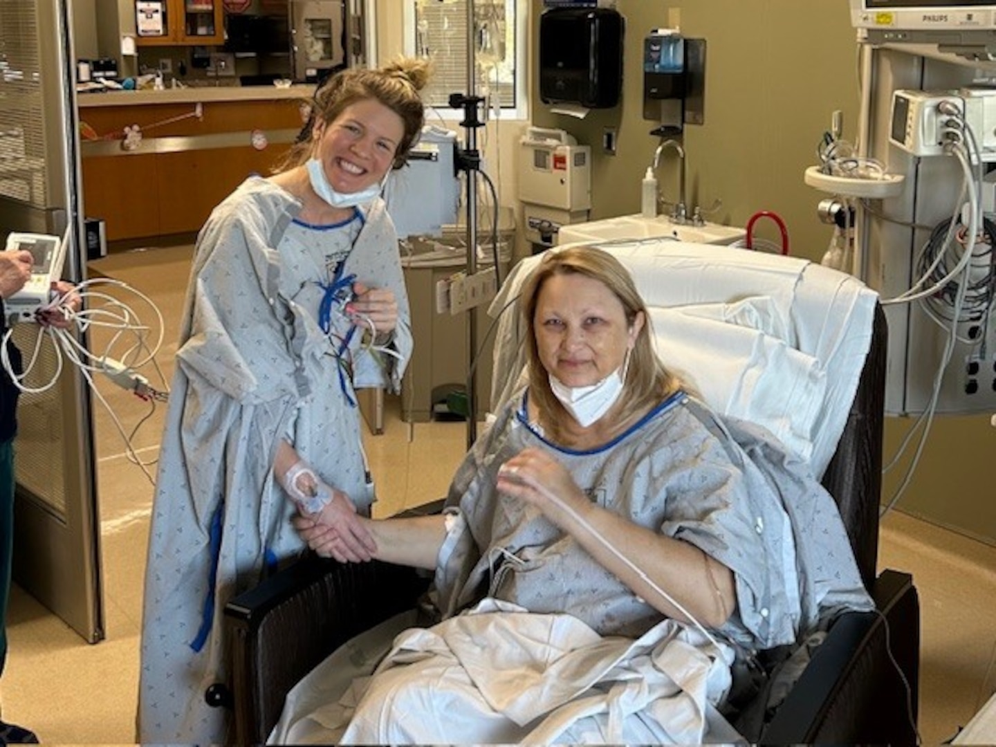 Catherine Higginbotham, shares a moment with Megan Boyd, who donated a kidney to Higginbotham, one day after their surgeries at Walter Reed National Military Center in Bethesda on Mar. 28, 2024. (Photo courtesy of Catherine Higginbotham)