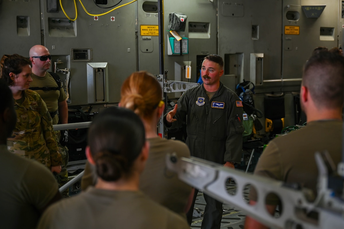 Airmen receive instruction from cadre aboard C17 Globemaster III.