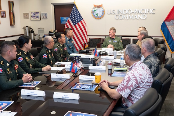 Adm. Samuel J. Paparo, commander of U.S. Indo-Pacific Command, engages with a Royal Cambodian Armed Forces delegation during a Bilateral Defense Dialogue at USINDOPACOM headquarters on Camp H.M. Smith in Honolulu, July 24, 2025.