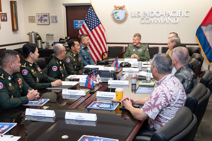 Adm. Samuel J. Paparo, commander of U.S. Indo-Pacific Command, engages with a Royal Cambodian Armed Forces delegation during a Bilateral Defense Dialogue at USINDOPACOM headquarters on Camp H.M. Smith in Honolulu, July 24, 2025.