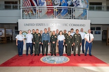 U.S. Air Force Brig. Gen. Sarah Russ, U.S. Indo-Pacific Command J5 Mobilization Assistant joins Royal Cambodian Armed Forces Lt. Gen. Suon Samnang, chairman of the Military Cooperation Coordination Group, and their delegations for a Bilateral Defense Dialogue group photo at USINDOPACOM headquarters on Camp H.M. Smith in Honolulu, July 24-25, 2025.