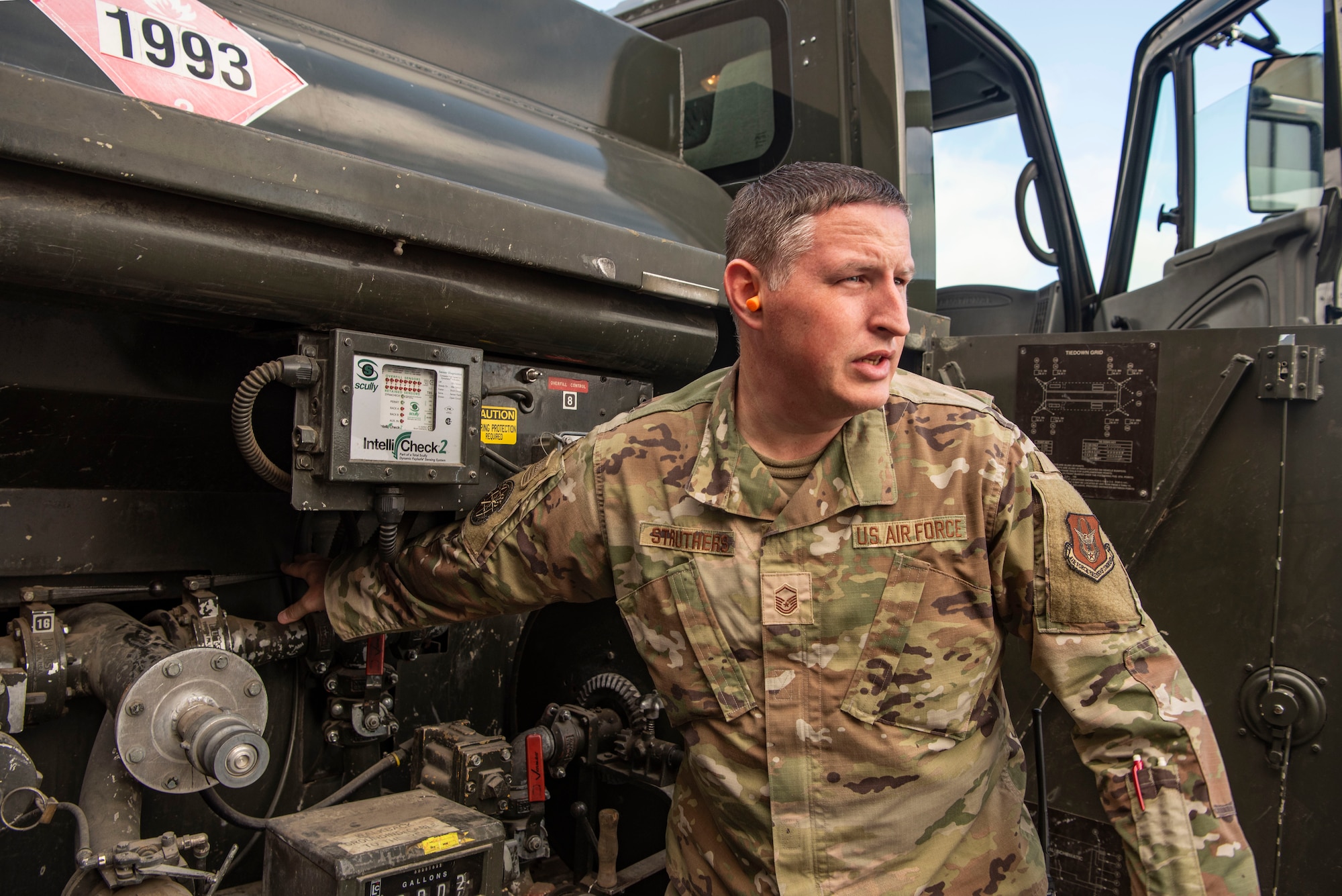 U.S. Air Force Master Sgt. Tom Struthers, 927th Logistics Readiness Squadron fuels operations NCO in charge, operates a fuel truck while refueling an aircraft tug during Red Flag-Alaska 25-3 at Eielson Air Force Base, Alaska, July 25, 2025.