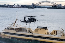 NEW SOUTH WALES, Australia (July 8, 2025) — U.S. Naval Special Warfare (NSW) operators, soldiers from Australia’s Special Operations Command, and United Kingdom Royal Marine Commandos from 42 Commando board a simulated target vessel for Visit, Board, Search and Seizure training with a U.S. Army MH-60 helicopter assigned to 160th Special Operations Aviation Regiment (Airborne) during exercise Talisman Sabre 25 in New South Wales, Australia, July 8, 2025. Talisman Sabre is the largest bilateral military exercise between Australia and the United States, with multinational participation, advancing a free and open Indo-Pacific by strengthening relationships and interoperability among key allies and enhancing our collective capabilities to respond to a wide array of potential security concerns. NSW provides maritime special operations force capabilities to enable Joint Force lethality and survivability inside denied and contested areas. (U.S. Navy photo by Mass Communication Specialist 2nd Class David Rowe)